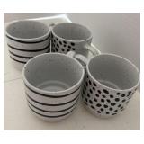 Four gray and black stripe and dotted mugs