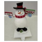 Snowman stocking hanger very heavy good condition
