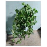 Plant stand with faux plant