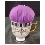 Vintage Royal Crown Derby Imari cup with a pin