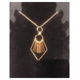 Goldtone charmed necklace