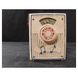 Vintage Fisher Price music box pocket radio.