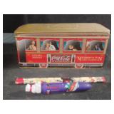 Coca-Cola collectible metal tin can with pencils