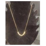 Golden beaded necklace