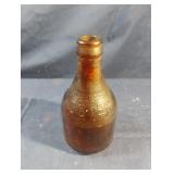 Vintage Koster brown glass bottle