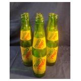 Vintage mellow Yellow 10 fl oz green glass
