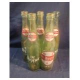 Vintage Dr. Pepper 10 fl oz green glass bottles.
