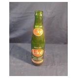 Vintage Like 10 fl oz green glass bottle