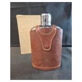 vintage leather-wrapped glass hip flask glass