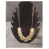 Gold colored fashion necklace