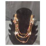 Multi-stranded browns beaded necklace