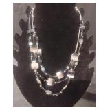Multi-stranded beaded necklace