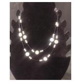 Multi-stranded beaded necklace