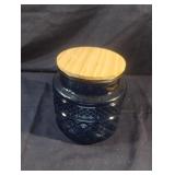 Light blue glass canister with wood lid