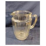 Vintage clear glass pitcher with a ribbed design