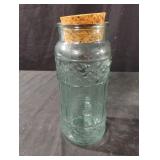 Decorative teal glass canister
