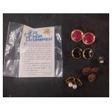 Earrings, buttons and a pin