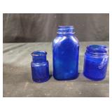 Miniature collectible cobalt blue glass bottles