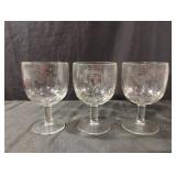 Vintage Libby glass tumblers featuring etched