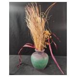 Decorative ceramic planter with faux flowers