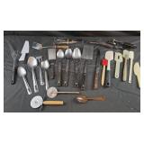 Assorted spoons, spatulas,  enamel spoon, pizza