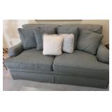 71x36x40 sage green couch and pillows