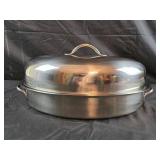 Large stainless steel oval roaster with a domed