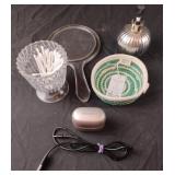 Soap dispenser, handheld mirror, hearing aid and