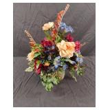 Floral arrangement in a pottery vase 13 1/2" tall