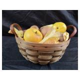 Basket with faux fruit