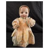16" doll with yellow and green dress and matching