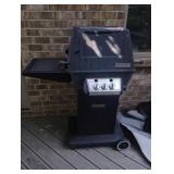 Ducane charcoal-gas grill with cover