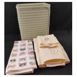 Cat towels and a small waste basket