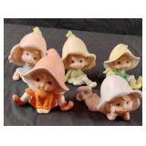 Vintage ceramic figurines known as Homco Pixie