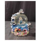 Dolphin musical snow globe. Music doesn