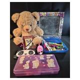 Teddy bear, chalk board, wallet. Small toys,