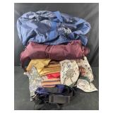 Assortment of vintage table clothes, fabrics,