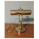 Brass colored desk lamp