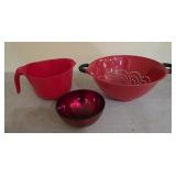 Red plastic colander and mixing bowl with handle,