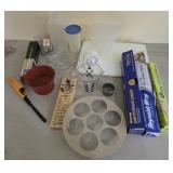Assorted kitchen tools, cutting board, aluminum