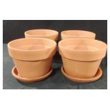 Terra Cotta planters with plates. Set of 4