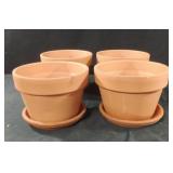Terra Cotta planters with plates. Set of 4