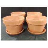 Terra Cotta planters with plates. Set of 4