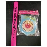 character spiral notebook, and pink ruler slap
