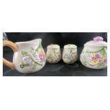 ceramic salt and pepper, cream, and sugar jar