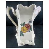 glass pitcher with floral design