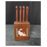 Vintage farmhouse wooden block with steak knives