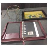 Plant stand, notebook and vintage framed print of