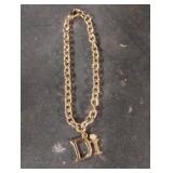 Di gold colored bracelet