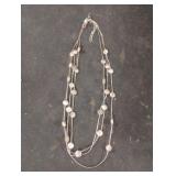Silver colored beaded necklace